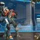 Two spartans stand back to back in a match of King of the Hill